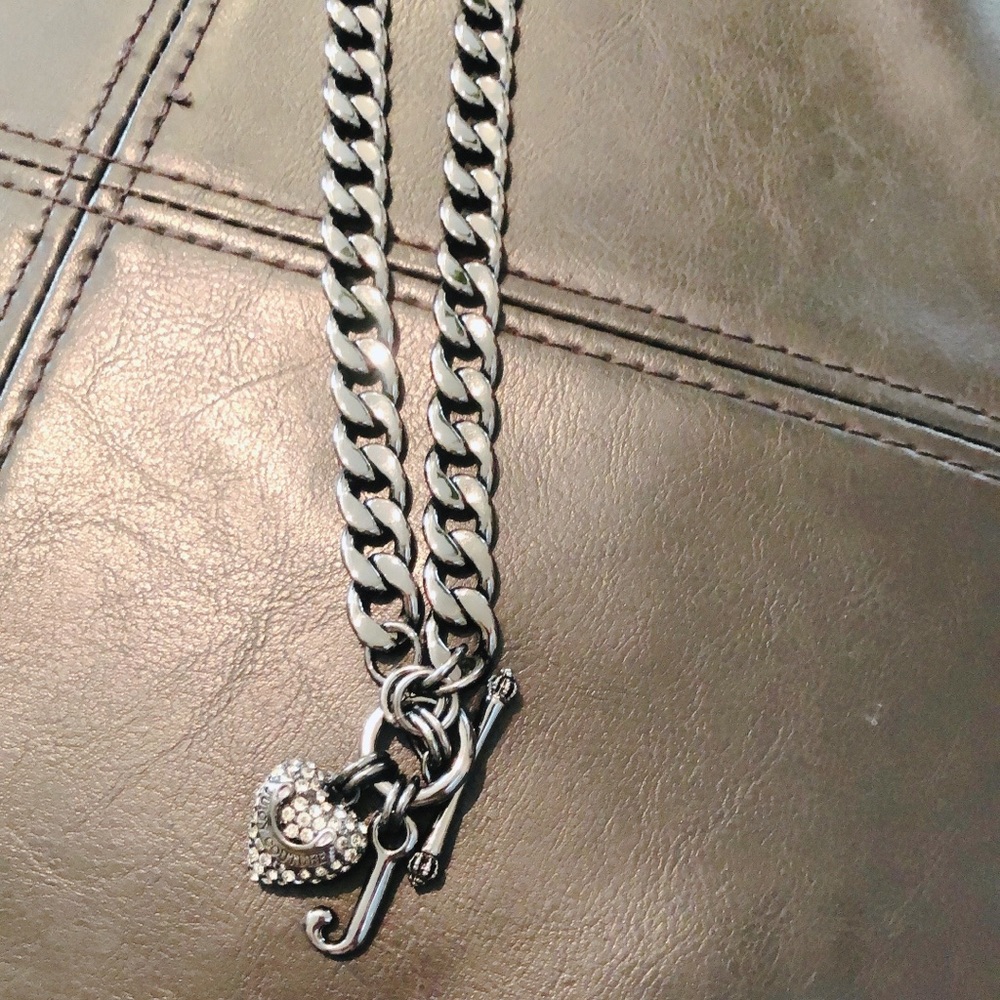 Juicy Couture heart and J necklace.